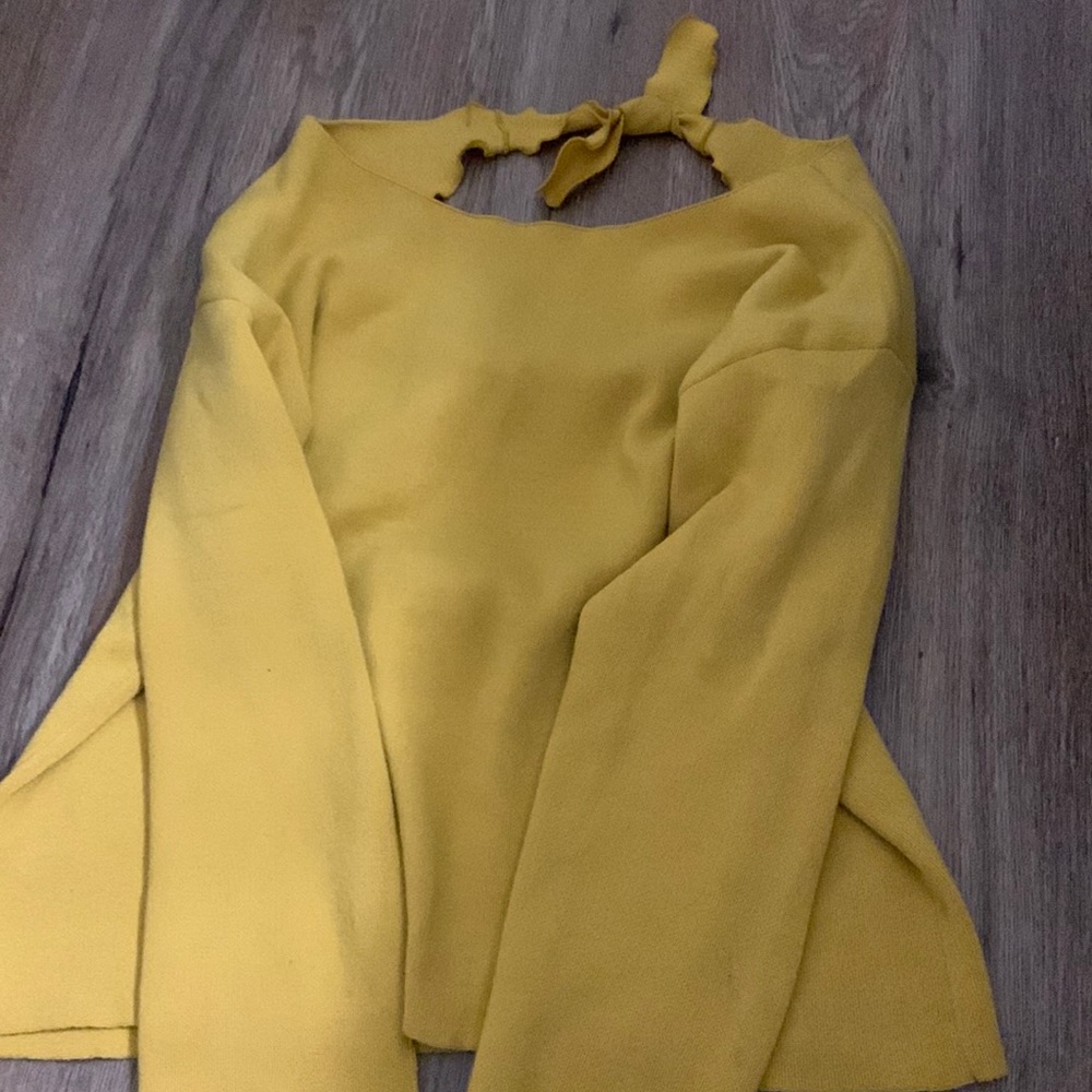 Thick Woman’s Sweater W/ Open Back